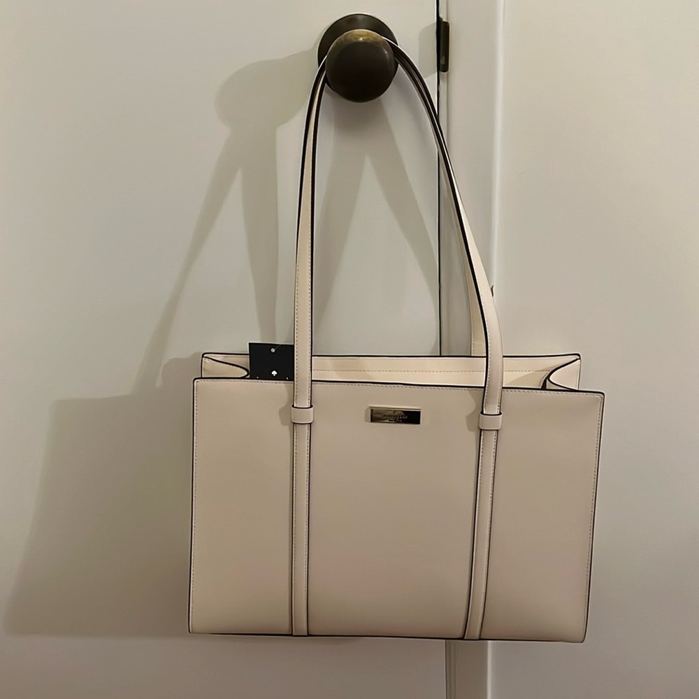 Kate Spade shoulder bag- beautiful meringue color, with zipper.